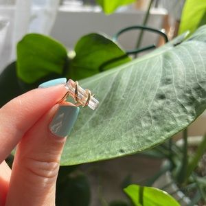 Gold ring with rectangular gemstone